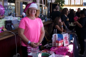 Sharon Covington at Breast Cancer Awareness Raffle table